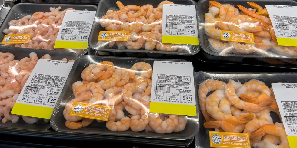 Woodinville, WA USA - circa December 2022: Close up, selective focus on packaged raw shrimp for sale in the refrigerated section of a Haggen grocery store. . shrimp retail supermarket fresh monterey bay seafood watch good alternative.