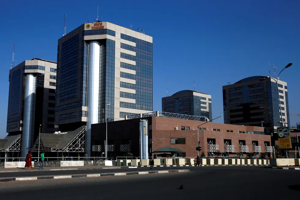 Key deal: the Nigerian National Petroleum Corporation - the headquarters of which are seen here in Abuja - gave the go ahead for work to begin in OML 65