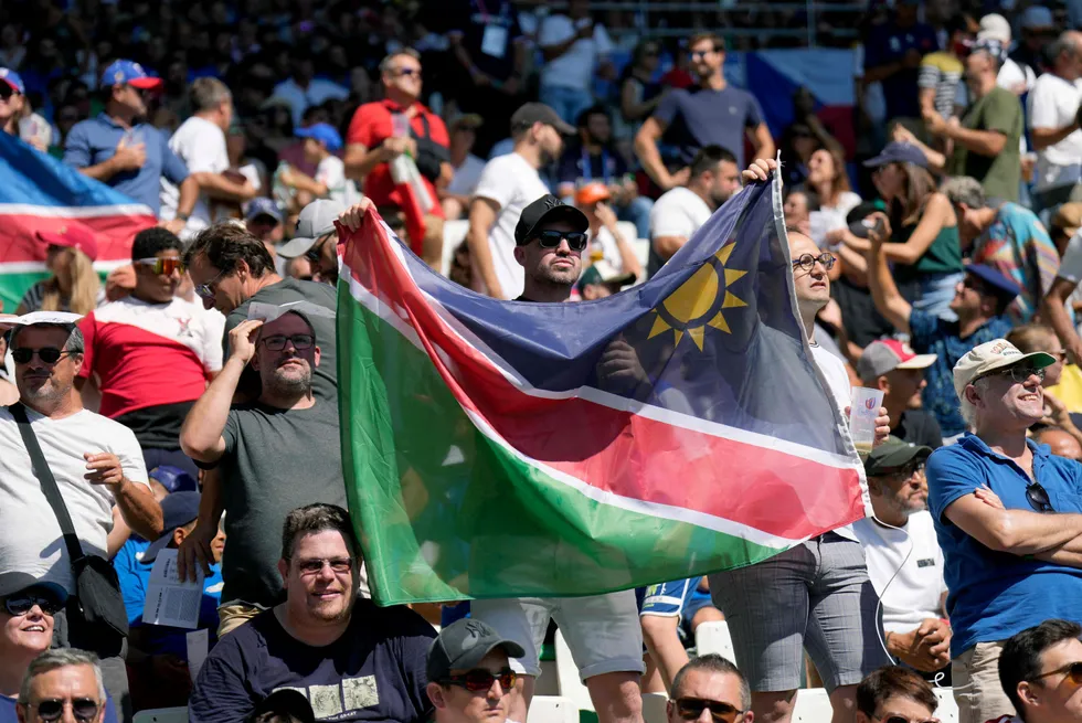 Namibia supporters wave their national flag ahead in the 2023 Rugby World Cup in France.