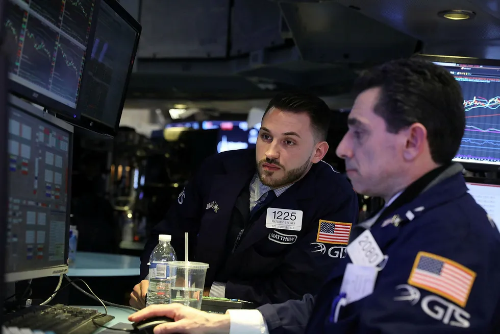 Spenning på New York-børsen ved åpning fredag. Foto: Specer Platt/Getty Images/AF/NTB Scanpix