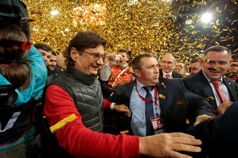Battle: Lukoil vice president Leonid Fedun (left) leaves the pitch after the victory of FC Spartak in Moscow, Russia, in May 2017. FC Spartak won the national championship that year