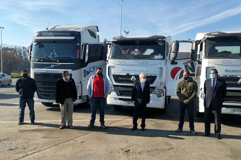 Before this latest incident Chilean President Sebastian Pinera (third right) met with truckers to unveil a bill aimed at protecting their vehicles from attack.