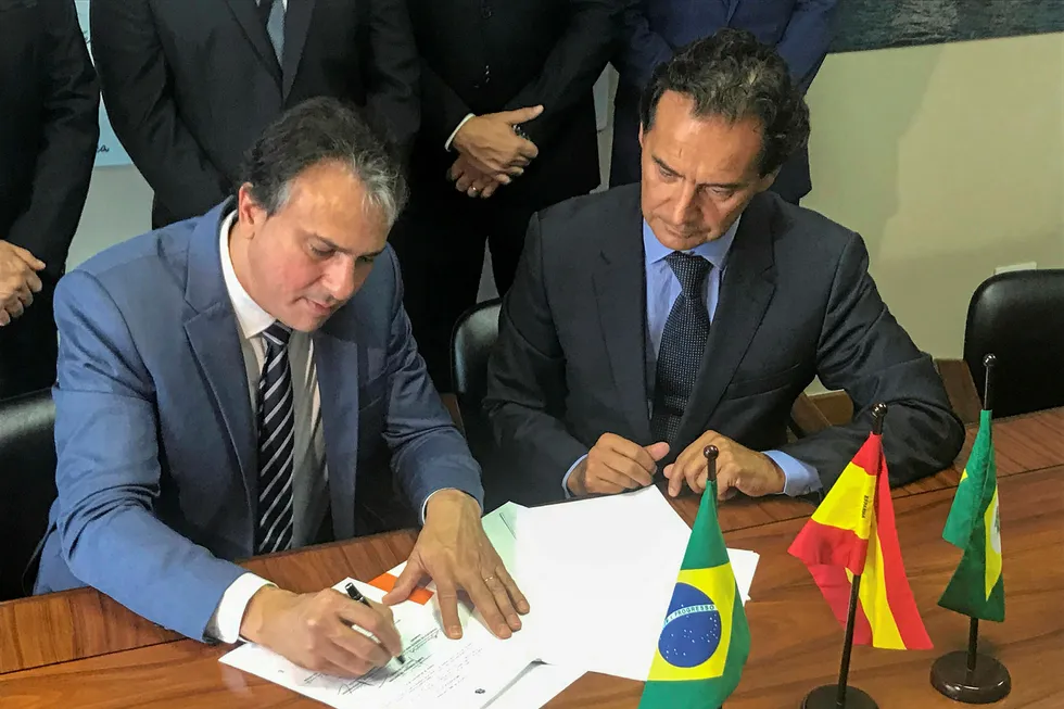 Ceara state governor Camilo Santana signs the agreement alongside Jealsa global group President Jesus Manoel Alonso.