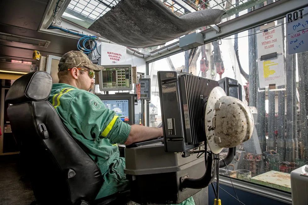 Acquisition: A worker on a Precision Drilling rig in the US Permian basin.