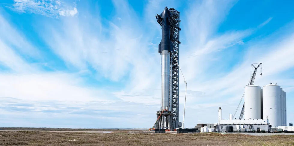 SpaceX's first orbital Starship SN20 stacked atop its massive Super Heavy Booster 4 at the company's Starbase facility near Brownsville, Texas.