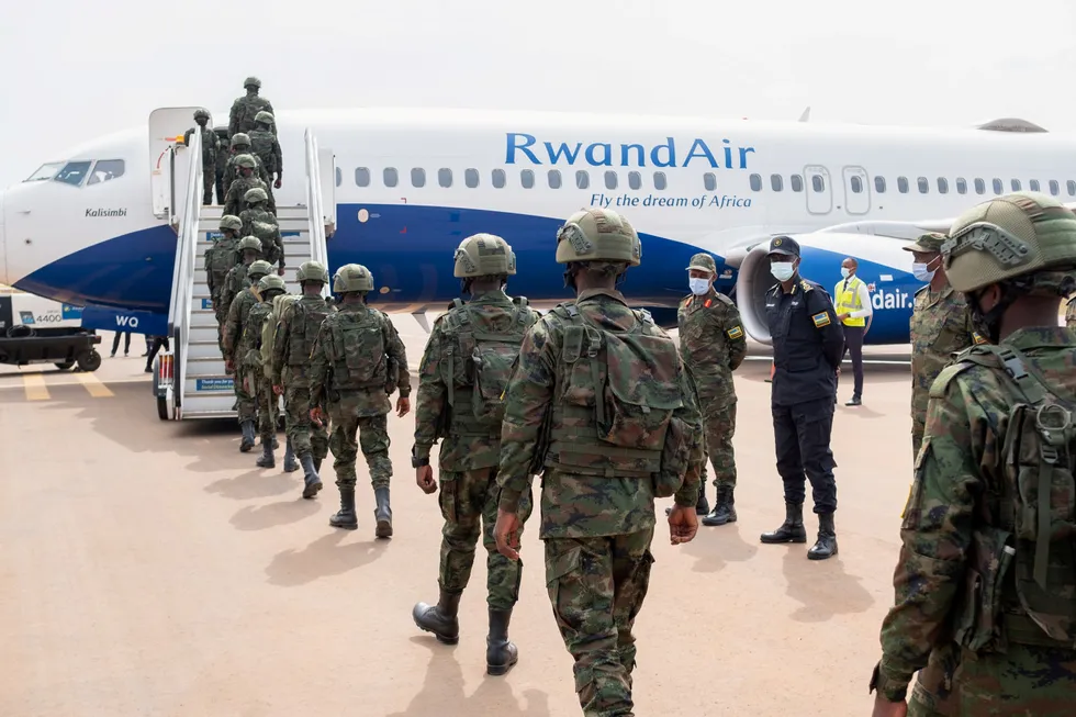 Deployed: Rwandan military troops depart for Mozambique in early July to help the country combat an escalating Islamist insurgency