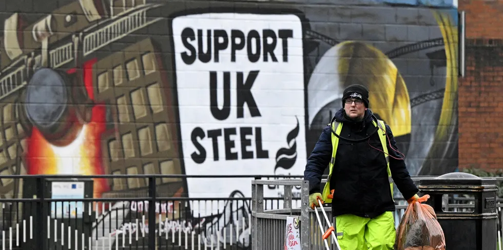 A mural in support of the UK Steel near to the Tata Steel Port Talbot integrated iron and steel works in south Wales. Tata Steel announced that it would close its last two blast furnaces to make way for a less polluting electric arc furnace.