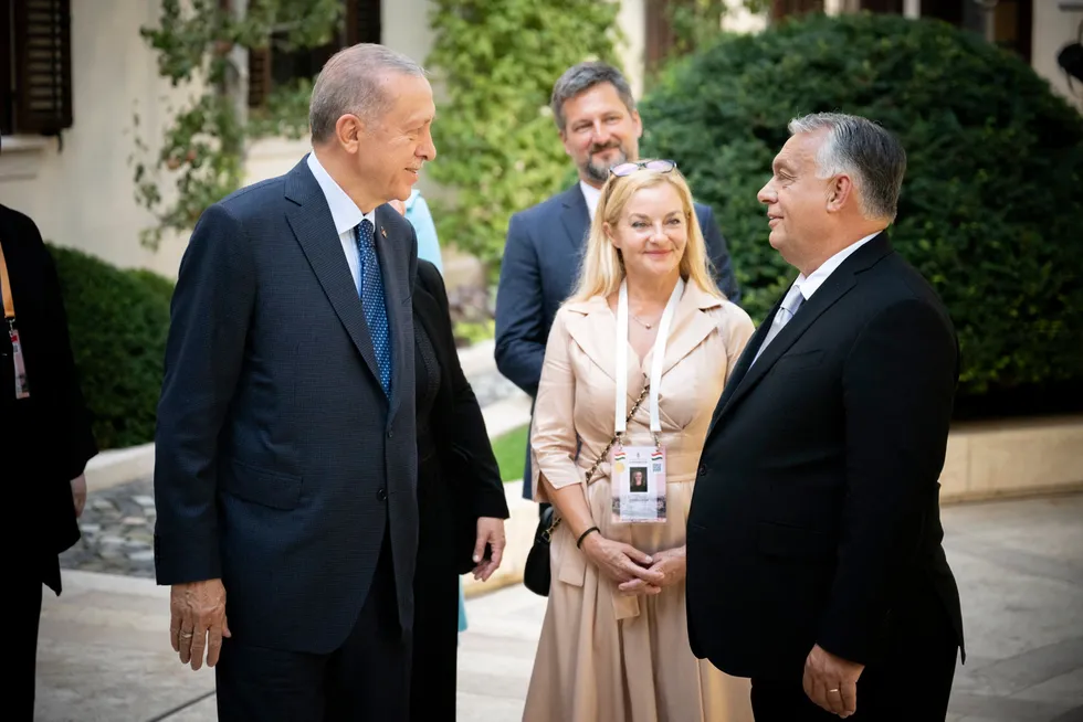 Turkish President Recep Tayyip Erdogan being welcomed by his host Hungarian Prime Minister Viktor Orban at the prime minister office of Budapest on August 20, 2023.