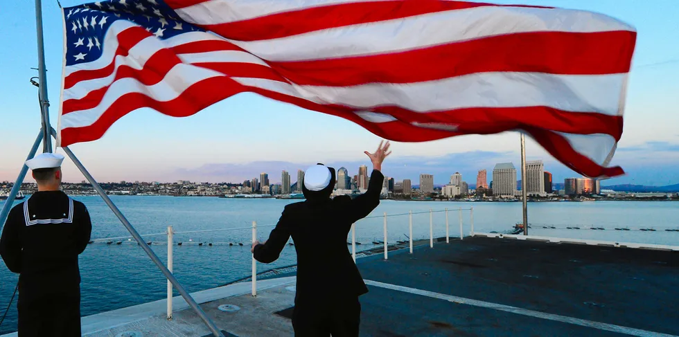 Lowering of the US flag aboard the aircraft carrier USS Ronald Reagan off California