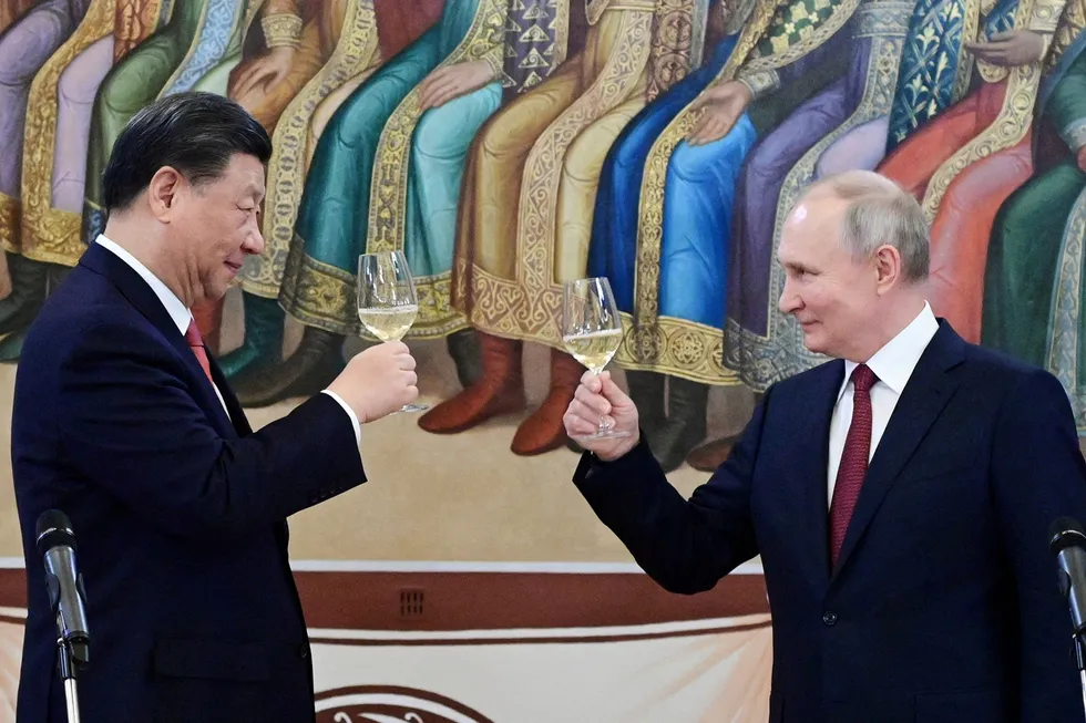 Plans: Chinese President Xi Jinping (left) and Russian President Vladimir Putin attend a reception at the Kremlin in Moscow.