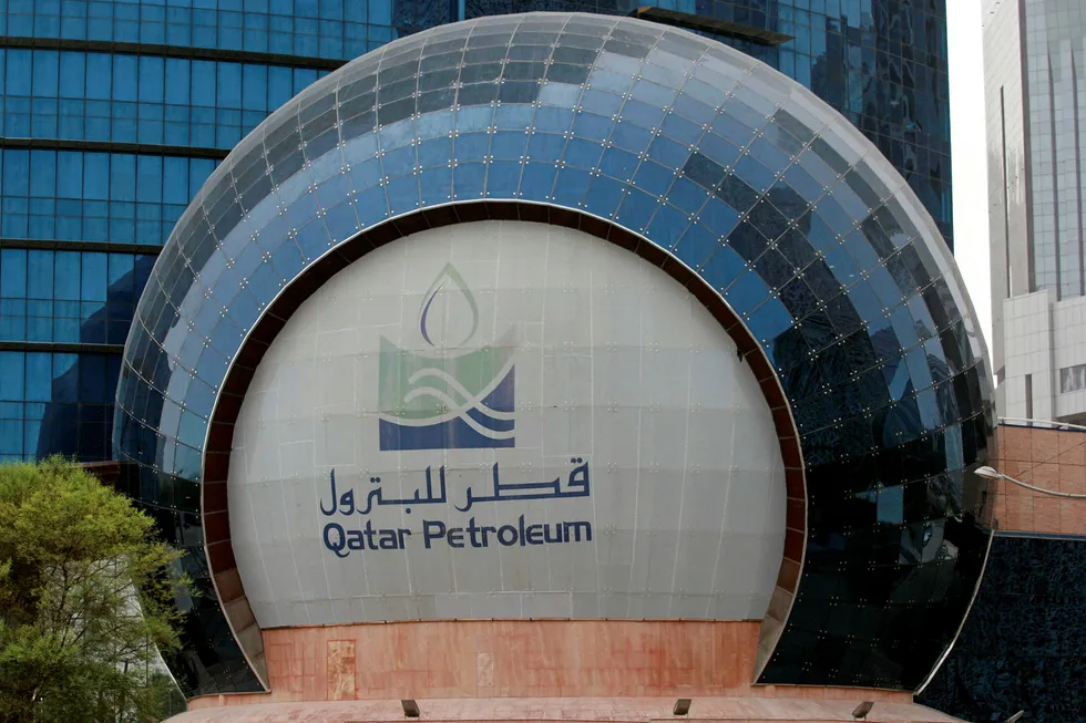 Home base: the Qatar Petroleum logo outside its headquarters in Doha