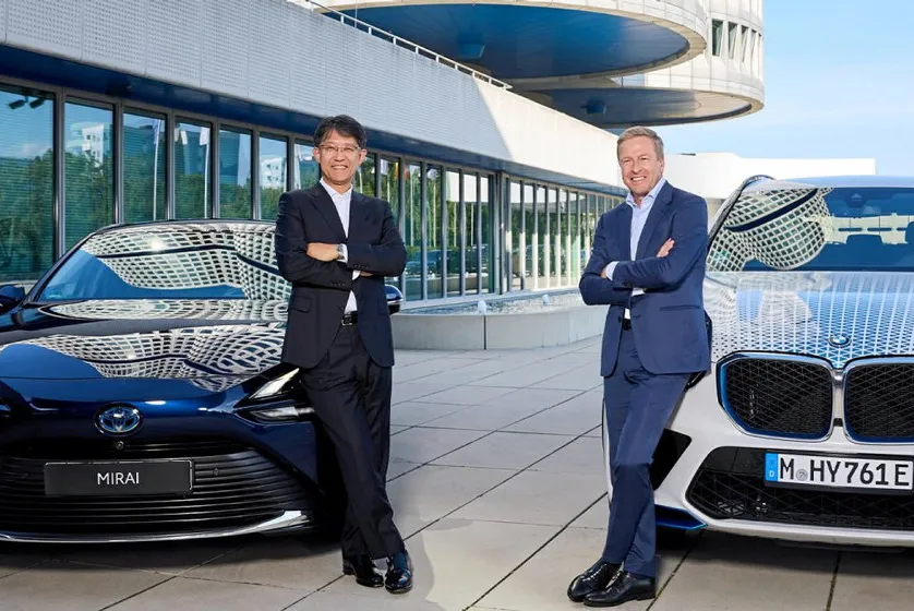 Koji Sato, president of Toyota and Oliver Zipse, chairman of BMW.