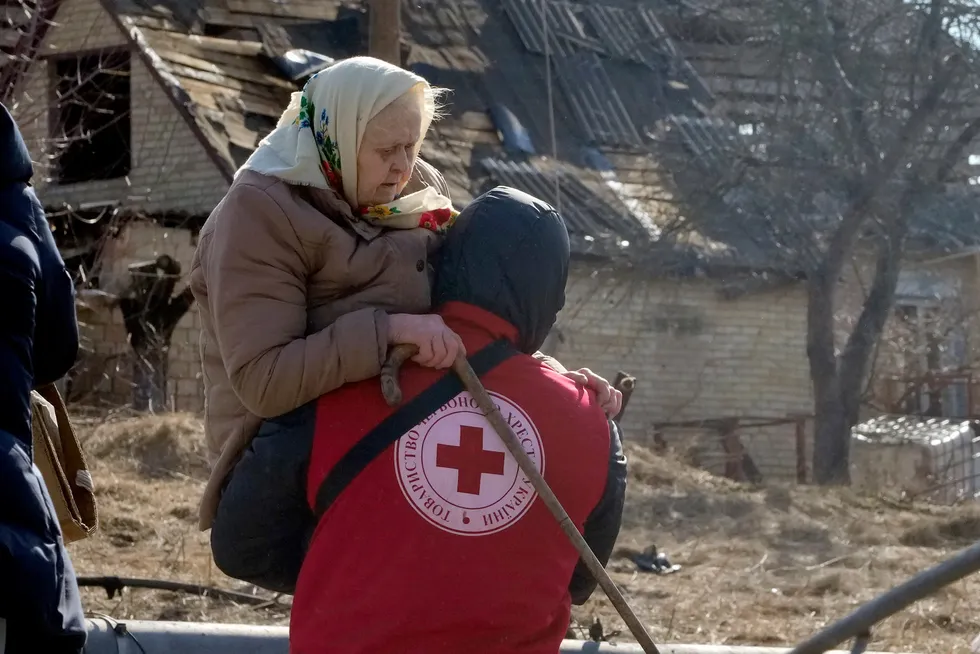 Donations: Neptune Energy’s money will help the Red Cross. A Red Cross worker is seen carrying an elderly women during an evacuation in Irpin, north-west of Kyiv, last week, after attacks by Russian armed forces