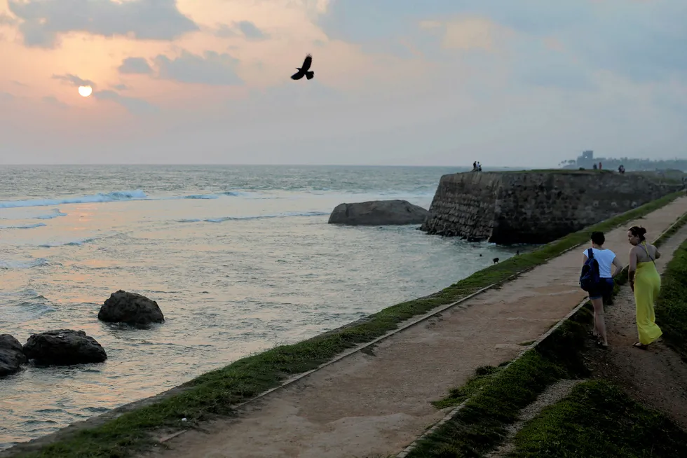 Eyeing up the offshore potential: pedestrians enjoying the view in Sri Lanka