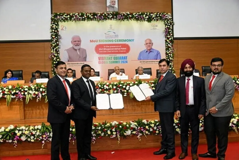 The MOU signing ceremony between the state of Gujarat and Erisha E Mobility.