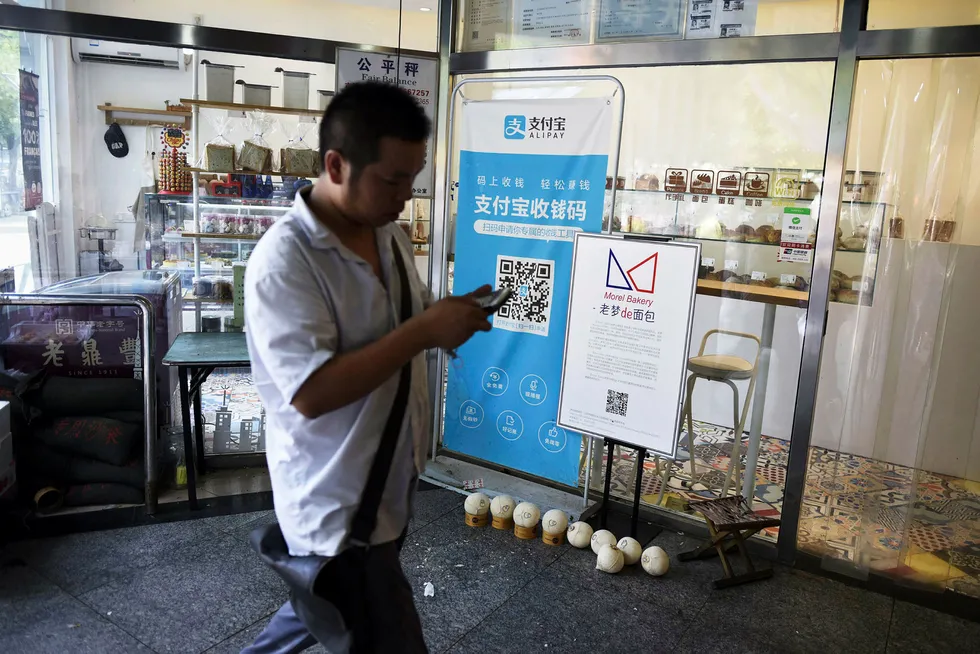 Kinas to største internettselskaper har kapret markedet for betalingstjenester. Ant Financial og Alipay-tjenesten er blitt verdens mest verdifulle finansteknologiselskap på tre år. Selskapet er sannsynligvis verdt like mye som den amerikanske finansinstitusjonen Goldman Sachs. Foto: Wang Zhao/AFP/NTB Scanpix