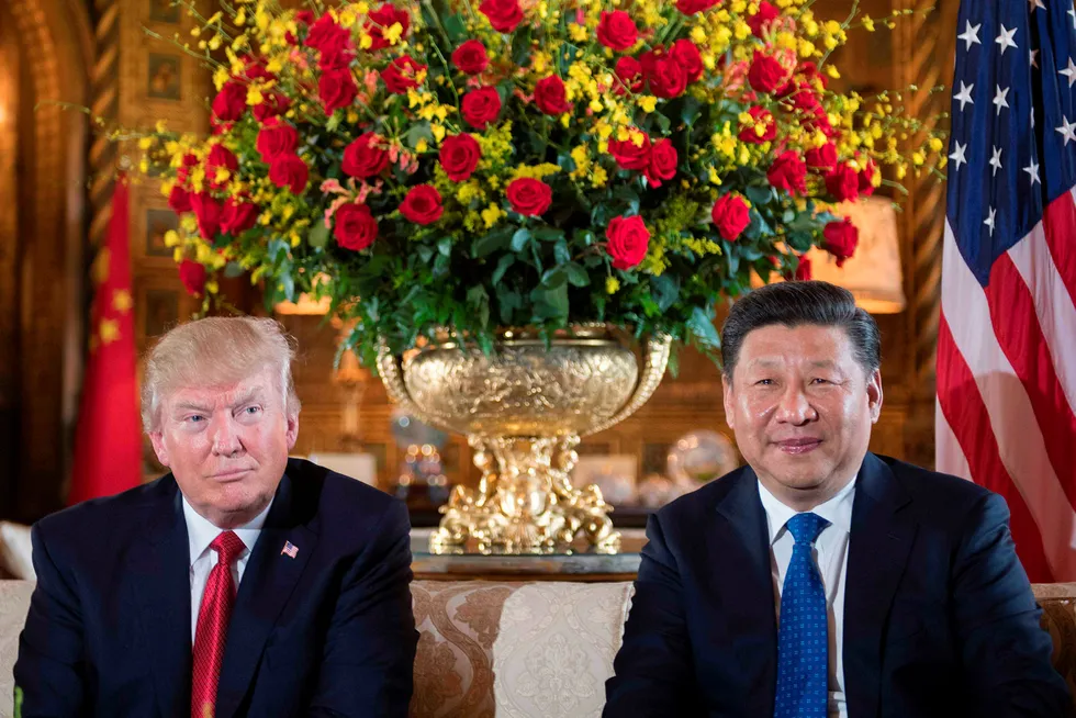 Kina lurer USA innen handel og valuta, hevdet Donald Trump før valget, og han lovet å stemple landet som en valutamanipulator. Foto: JIM WATSON