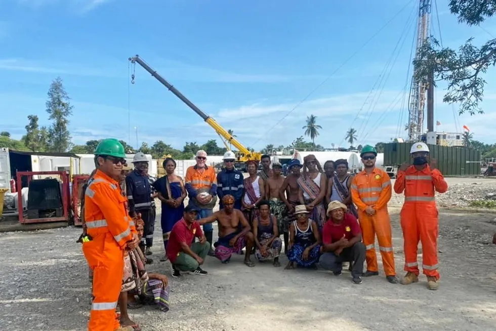 Wellsite workers: on a previous well in Timor-Leste
