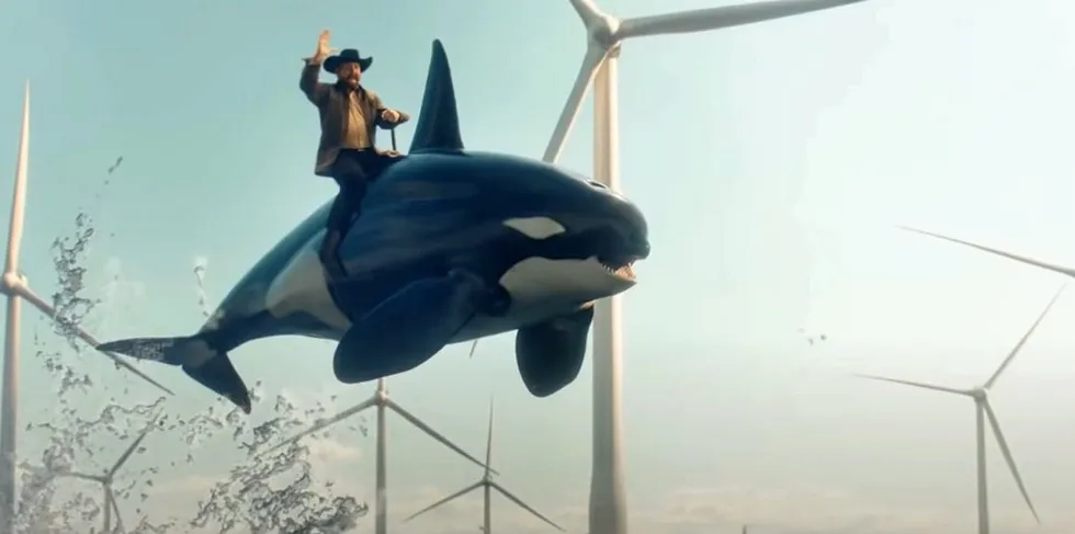 Chuck Norris rides an orca through a wind farm.