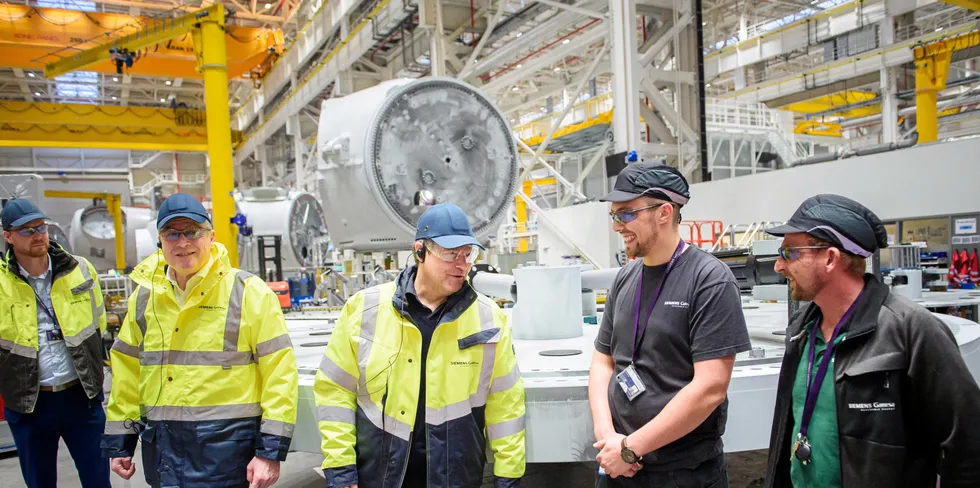 German vice chancellor Robert Habeck talks to workers while visiting the Siemens Gamesa wind turbine factory in Cuxhaven, Germany.
