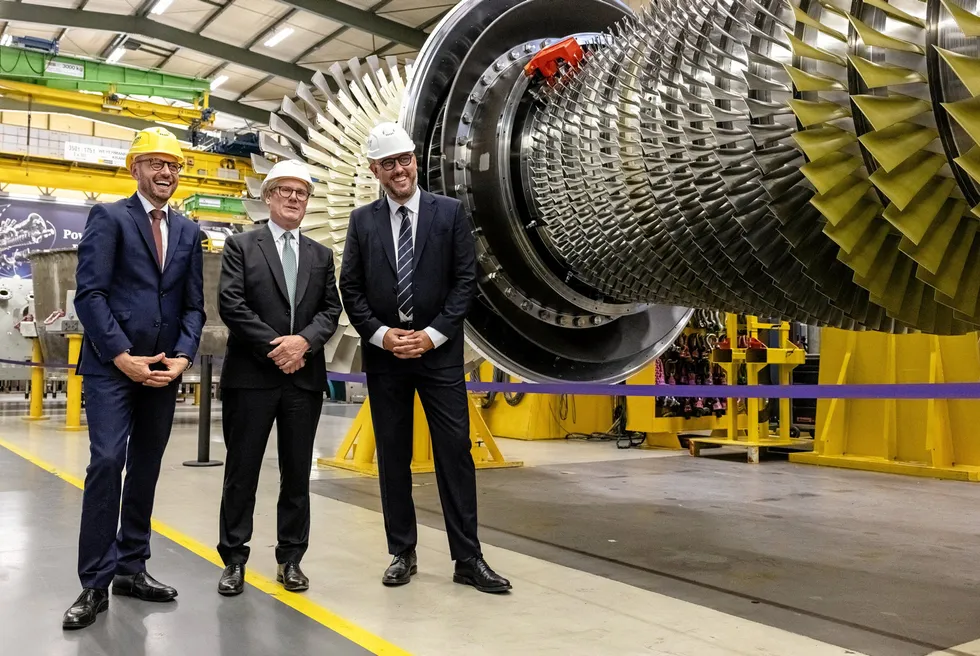 UK prime minister Keir Starmer with Siemens Energy's CEO Christian Bruch and Darren Davidson, the company's UK vice president at Siemens Energy's Clean Energy Centre in Berlin