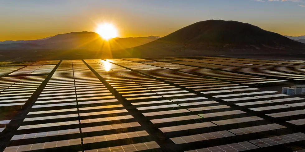 Aerial view of hundreds solar panels in the Atacama Desert, Chile.