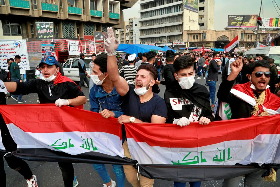 Demonstrations: anti-government protesters gather in Tahrir Square during ongoing protests in Baghdad this week