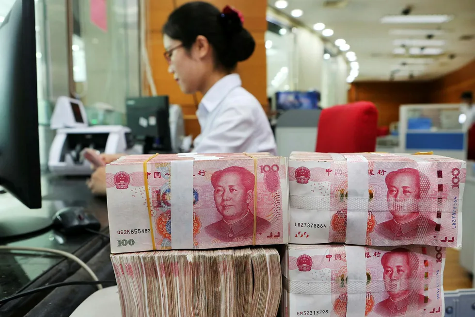 Kina vil forsvare den økonomiske veksten mot handelskrigen med USA – for enhver pris. Sentralbanken har tilført bankene mer penger for å låne ut, valutaen er svekket med nesten fem prosent og nå settes det i gang store infrastrukturprosjekter. Foto: AFP/NTB Scanpix