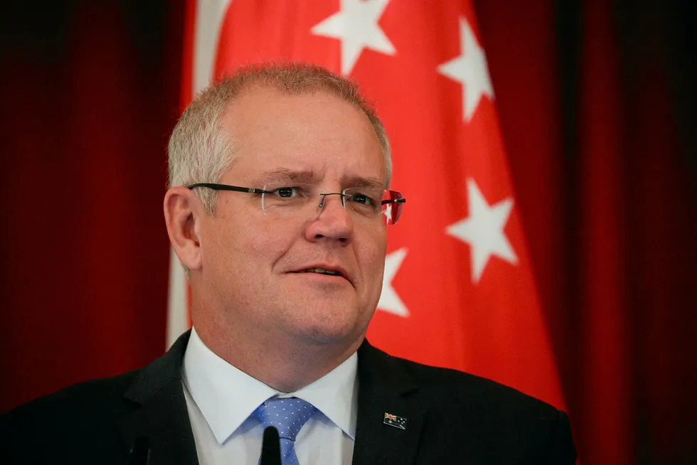 FILE PHOTO: Australian Prime Minister Scott Morrison speaks during a joint press conference at the Istana Presidential Palace in Singapore, 07 June 2019. Wallace Woon/Pool via REUTERS/File Photo
