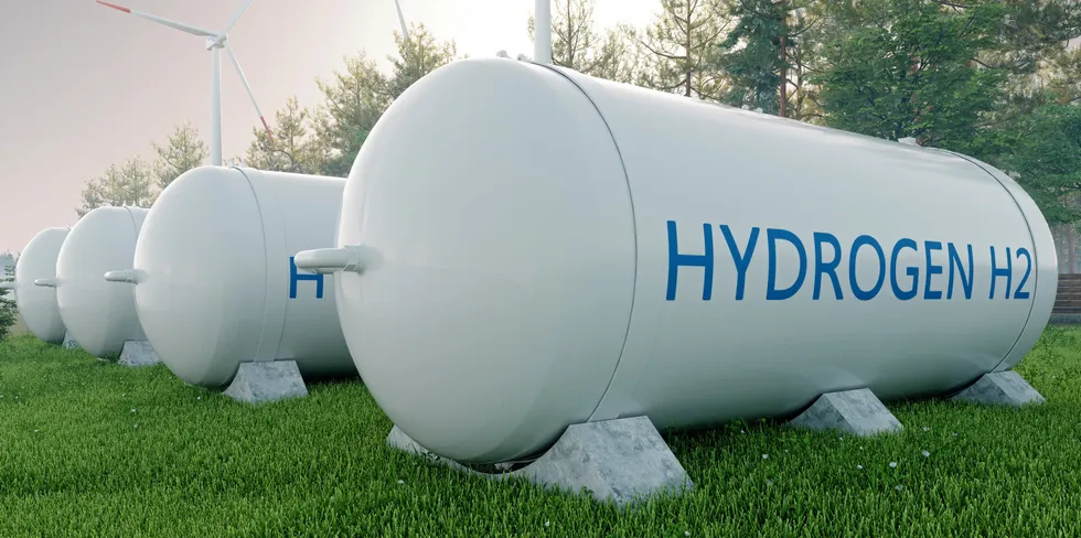 A rendering of hydrogen storage tanks at a wind farm.