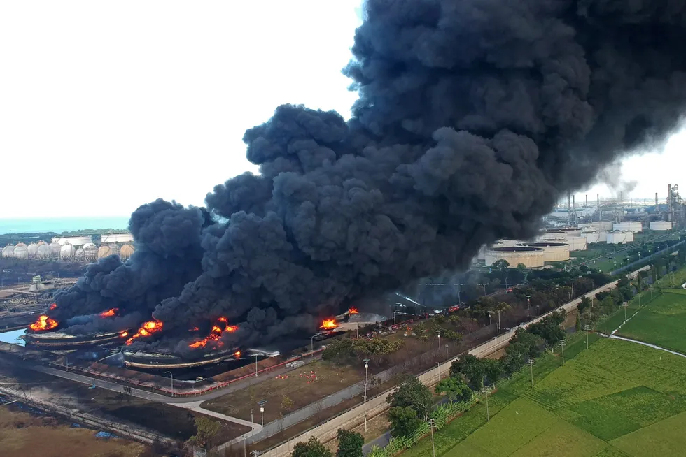 Still burning: an aerial picture shows smoke rising during fire at Pertamina's oil refinery in Balongan, West Java province, Indonesia