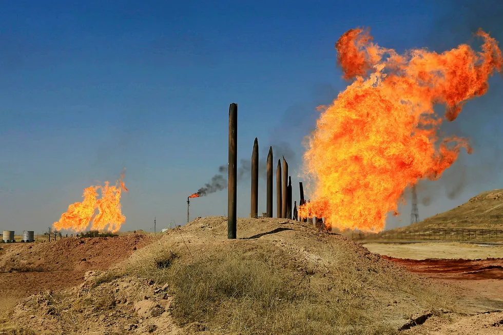 Key assets: flames emerge from flare stacks at oilfields in Kirkuk