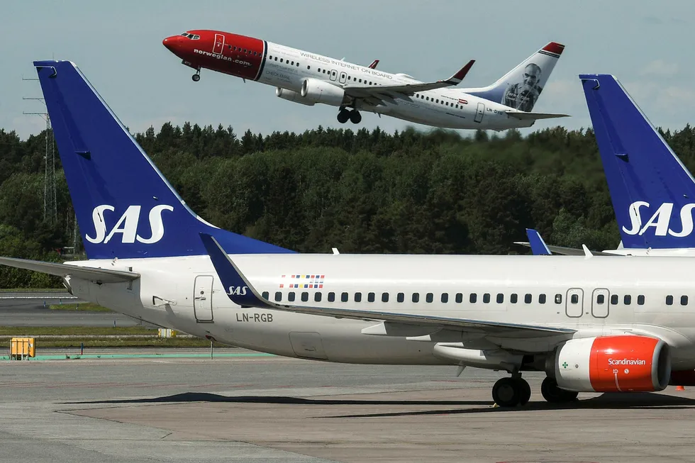 Norwegian har så langt i år hatt nesten like mange passasjerer som SAS. Foto: Johan Nilsson/TT/AFP photo/NTB scanpix