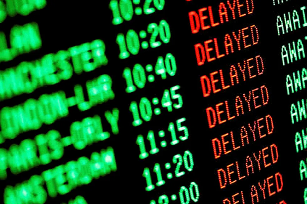 delayed sign airport board flight
