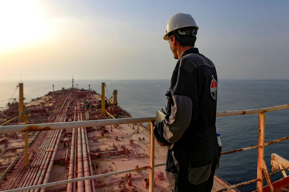 Critical: A worker stands on the deck of the beleaguered FSO Safer oil tanker in the Red Sea offshore Yemen's contested western province of Hodeida.