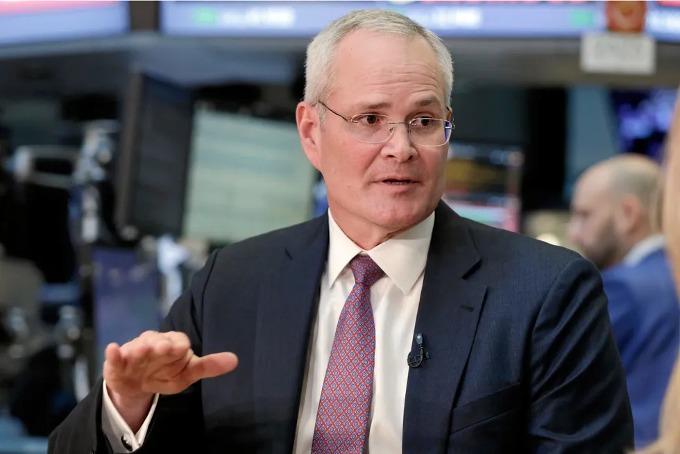 On the up: ExxonMobil chief executive Darren Woods