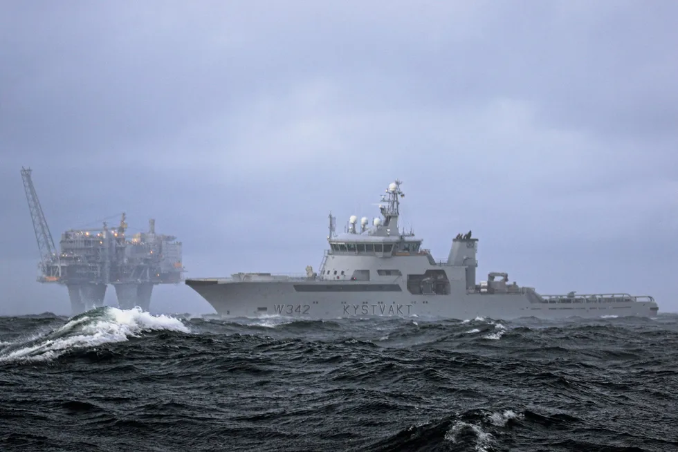 Patrol: a Norwegian navy vessel near a Troll A gas platform.