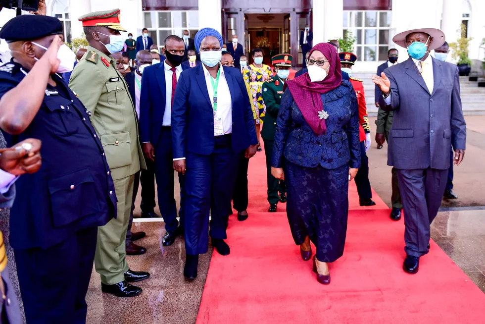 Signed and sealed: Uganda's President Yoweri Museveni (right) and Tanzania's President Samia Suluhu Hassan (second right) agreed three key deals at Entebbe on 11 April covering the East Africa Crude Oil Pipeline