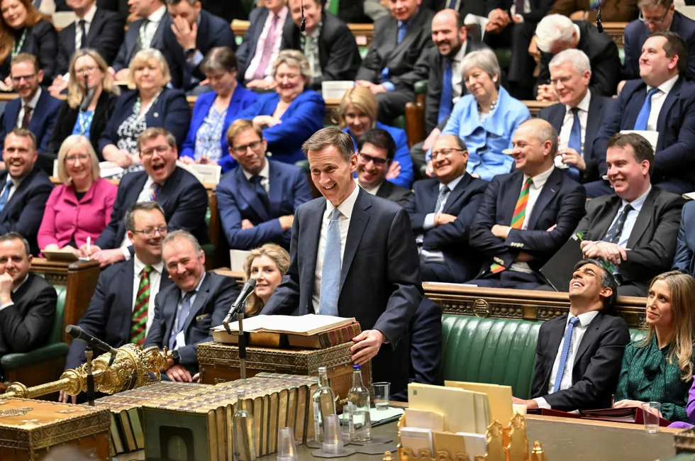 UK Chancellor of the Exchequer Jeremy Hunt presents the Financial Statement and Budget Report at the House of Commons in London.