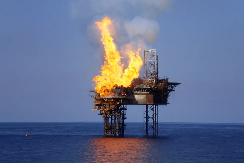 Engulfed by flames: the Montara wellhead platform and Seadrill's jack-up West Atlas before the relief well operations were completed in November 2009