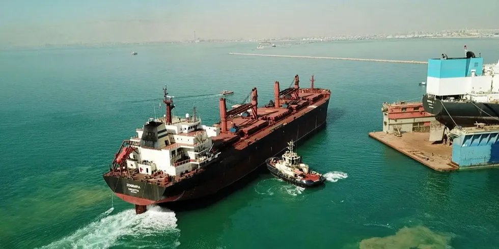 A Greek-owned bulk carrier at the Suez Shipyard Co. in Egypt undergoes repair work on damages caused by a missile attack in the Red Sea.