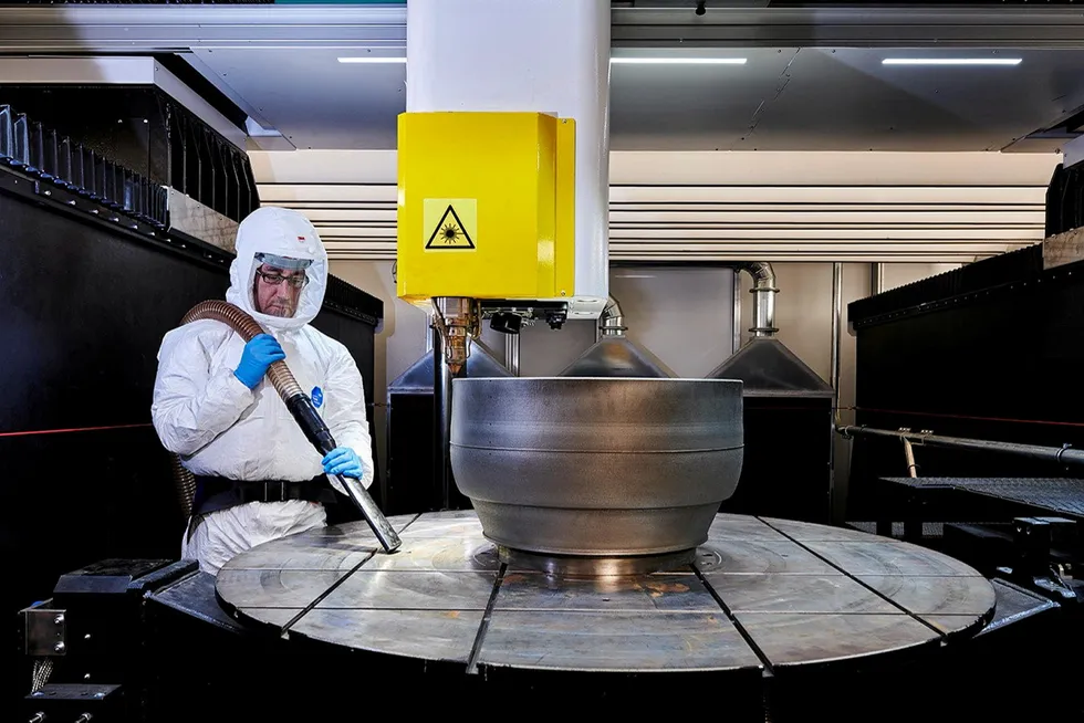 Mixing it up: a Baker Hughes employee at the company’s Massa, Italy, manufacturing facility is overseeing an additive manufacturing laser metal deposition process for a gas turbine