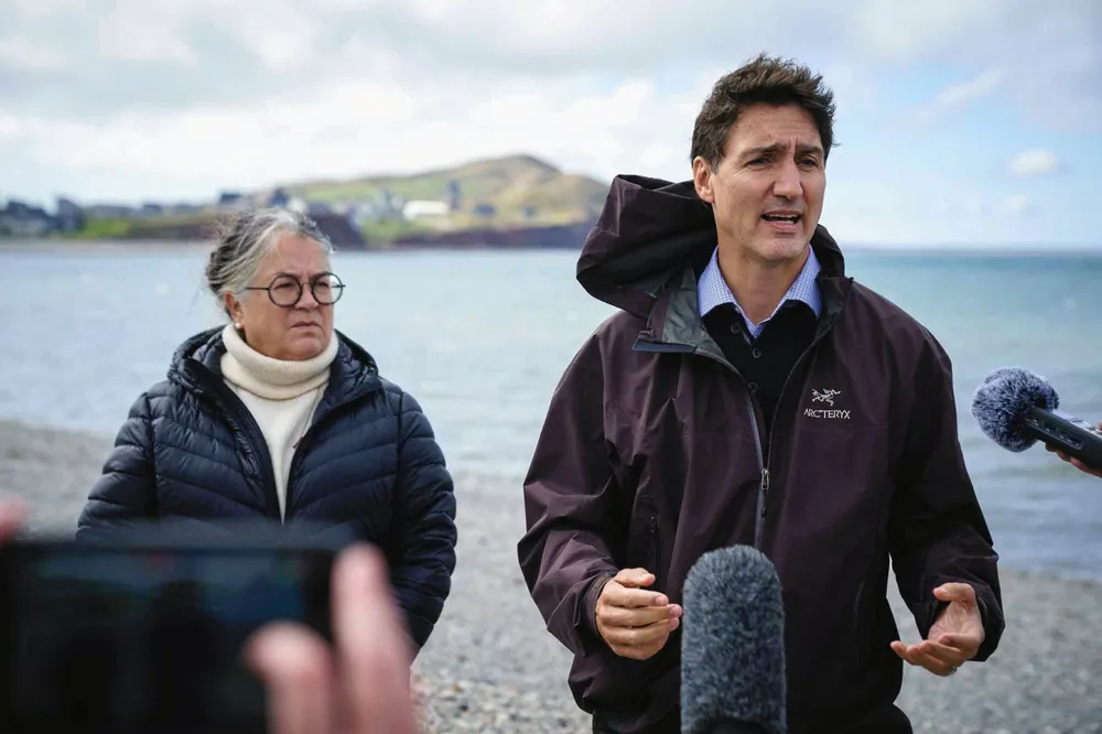 Justin Trudeau (right) speaking at a news conference with Diane Lebouthillier, fisheries minister for Canada, in 2023.