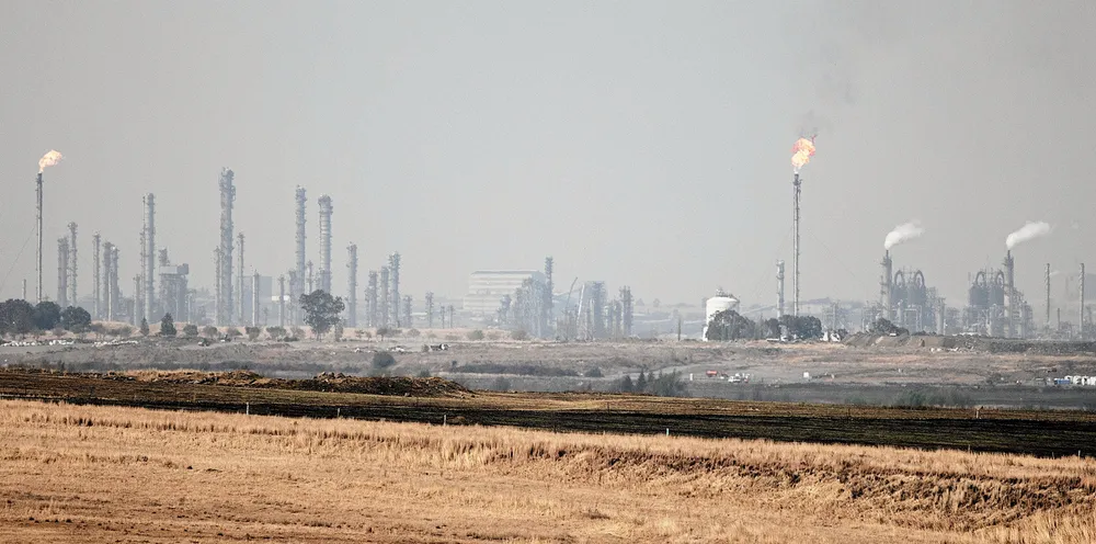 A picture taken on September 6, 2018 in Secunda shows the SASOL Secunda CTL that uses coal liquefaction to produce petroleum-like synthetic crude oil from coal.