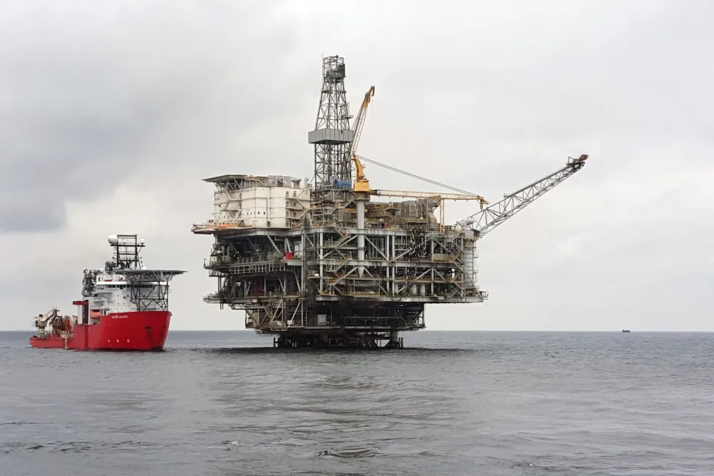 Key role: Subsea 7 was awarded contracts to install the flowlines and DEH system, and to provide topsides modifications and equipment. Pictured is the deepwater construction vessel Seven Pacific alongside the BBLT platform