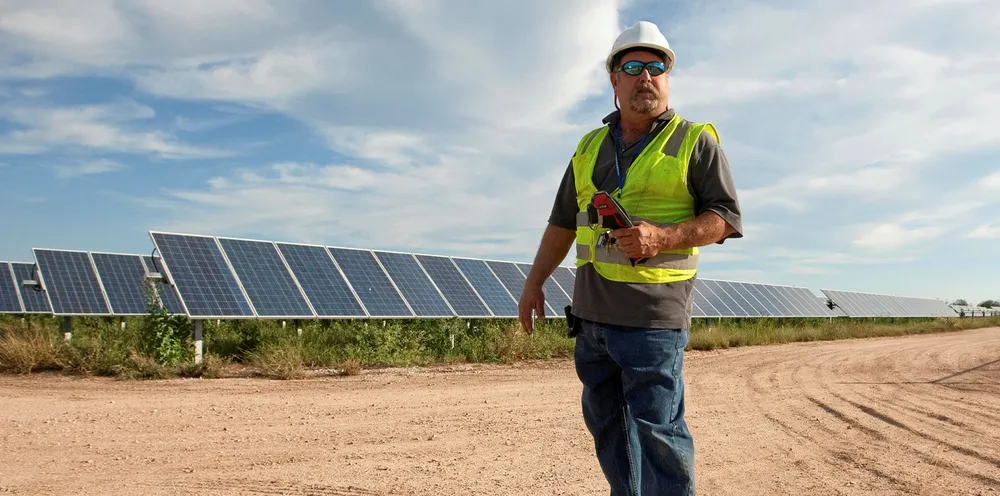 A worker at a solar farm in Texas.