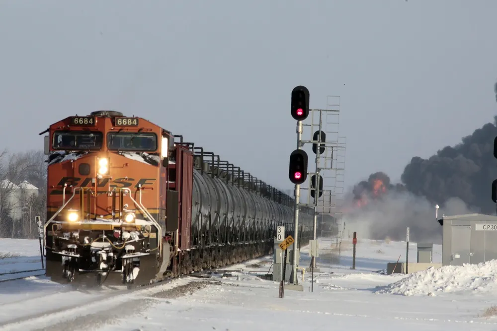Oil train bursts into flames after collision