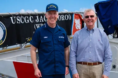 Representative Mike Ezell (right), who chairs the House Coast Guard and Maritime Transportation Subcommittee, poses with Admiral Kevin Lunday, the acting Coast Guard commandant.