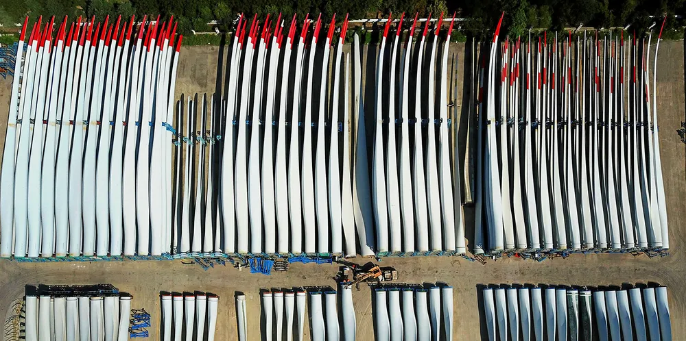 Wind turbine blades, seen here racked up for shipment in Lianyungang, Jiangsu Province, in China, are a key R&D investment area for OEMs