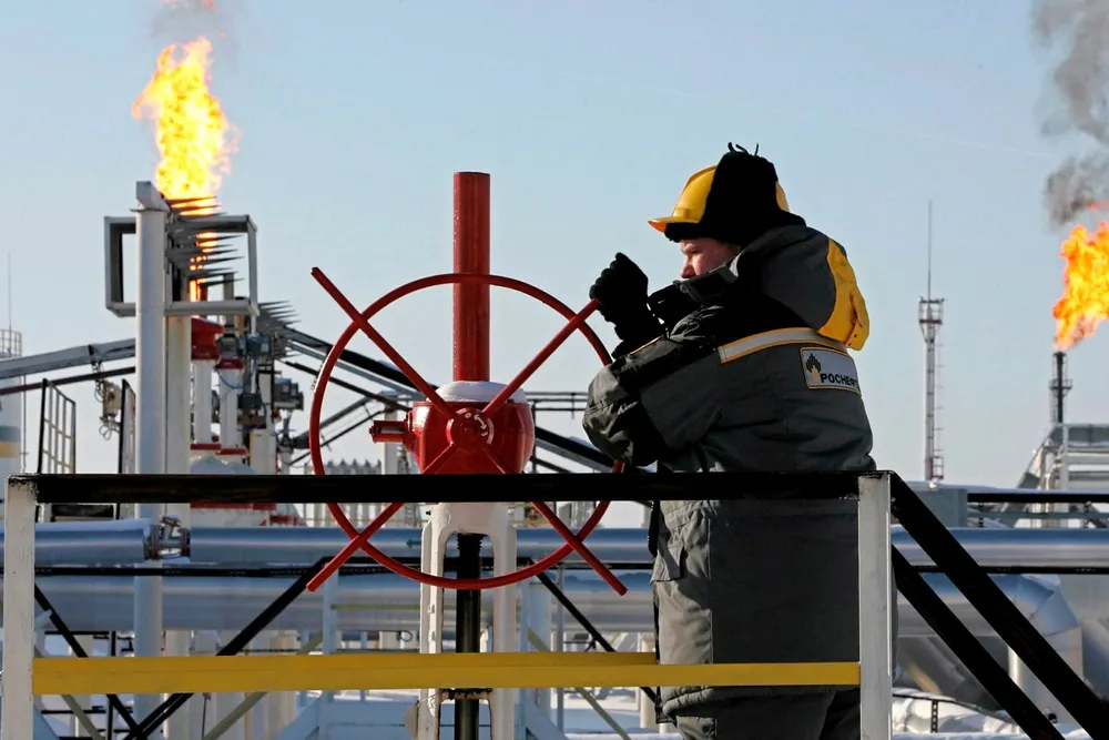 Old ways: flaring by-pass gas at a Rosneft-operated field in West Siberia, Russia